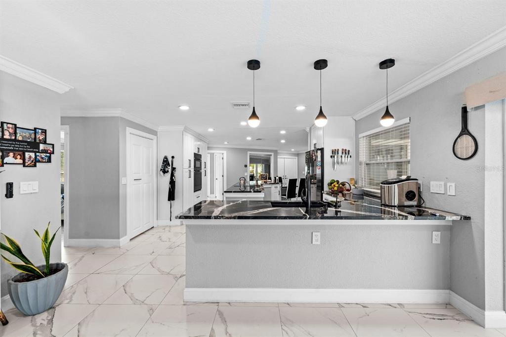 2850 Landover Drive Clearwater, FL 33761 - Photo 11 of 33 a view of a living room and kitchen