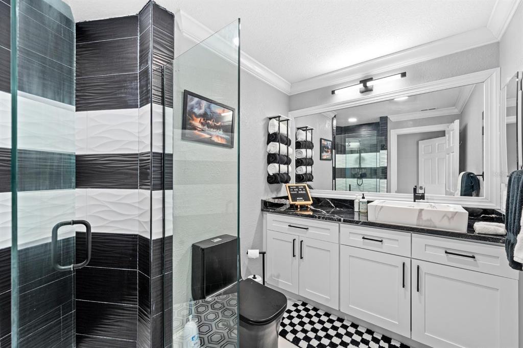 2850 Landover Drive Clearwater, FL 33761 - Photo 20 of 33 a bathroom with a double vanity sink and a