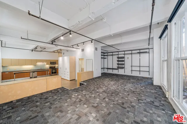 a view of a building with a street