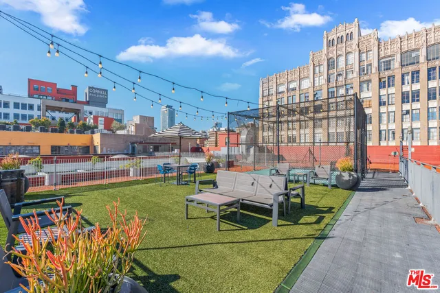 a view of a chairs and table in the terrace