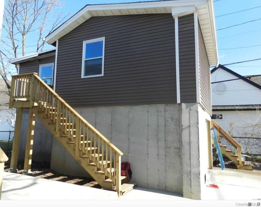 a balcony view with staircase