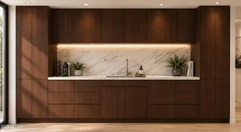 a kitchen with granite countertop a stove and a refrigerator