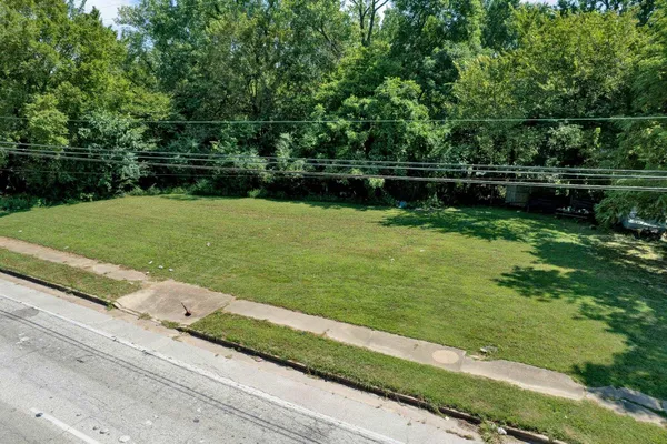 a view of a backyard with a small park