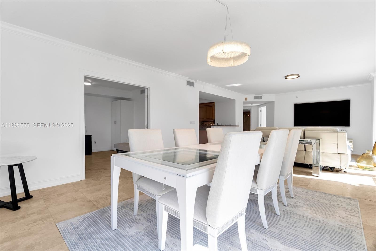 9 Northeast 20th Avenue, Unit 302 Deerfield Beach, FL 33441 - Photo 18 of 55 a view of a dining room with furniture