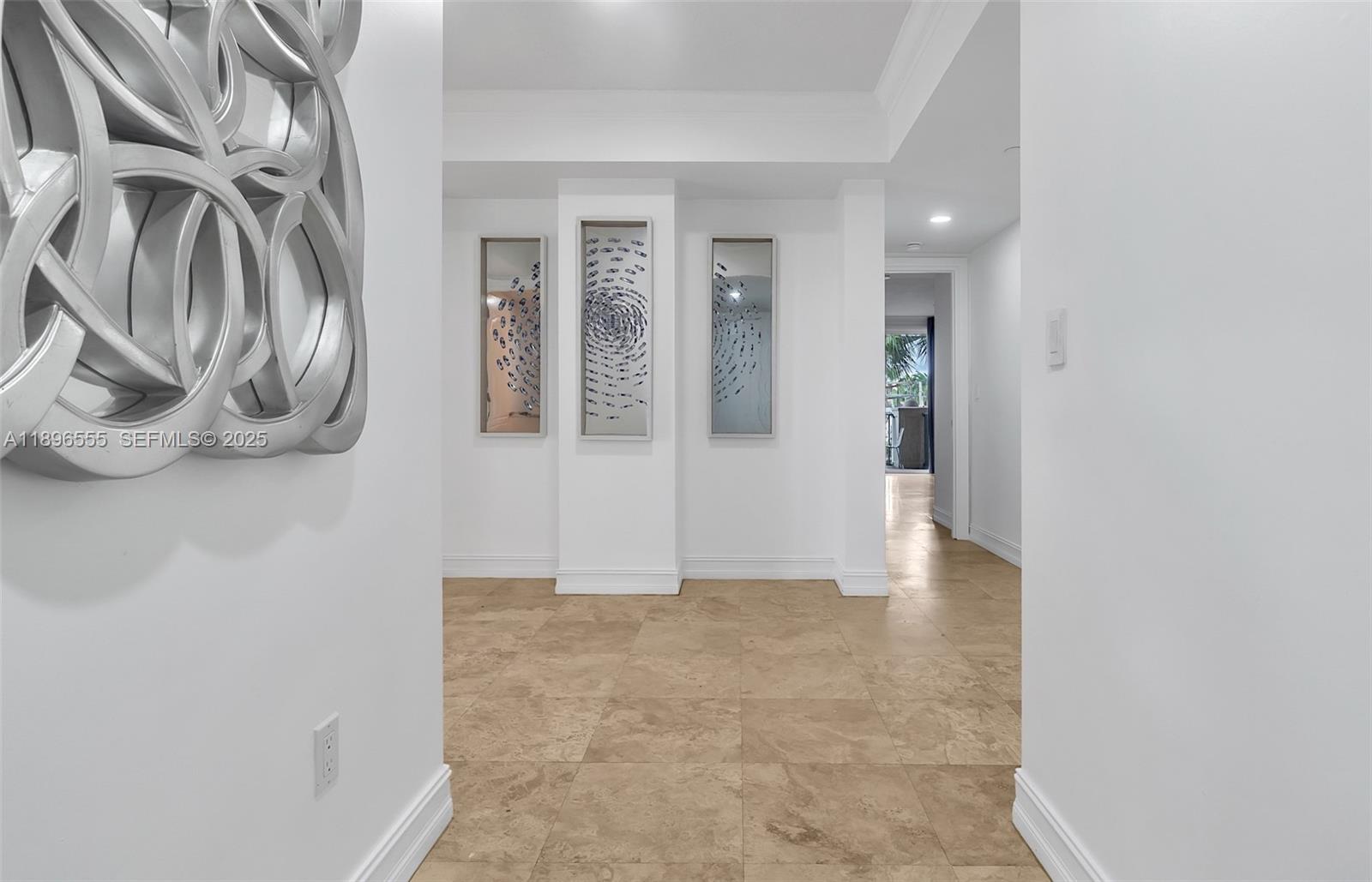 9 Northeast 20th Avenue, Unit 302 Deerfield Beach, FL 33441 - Photo 2 of 55 view of empty room with wooden floor