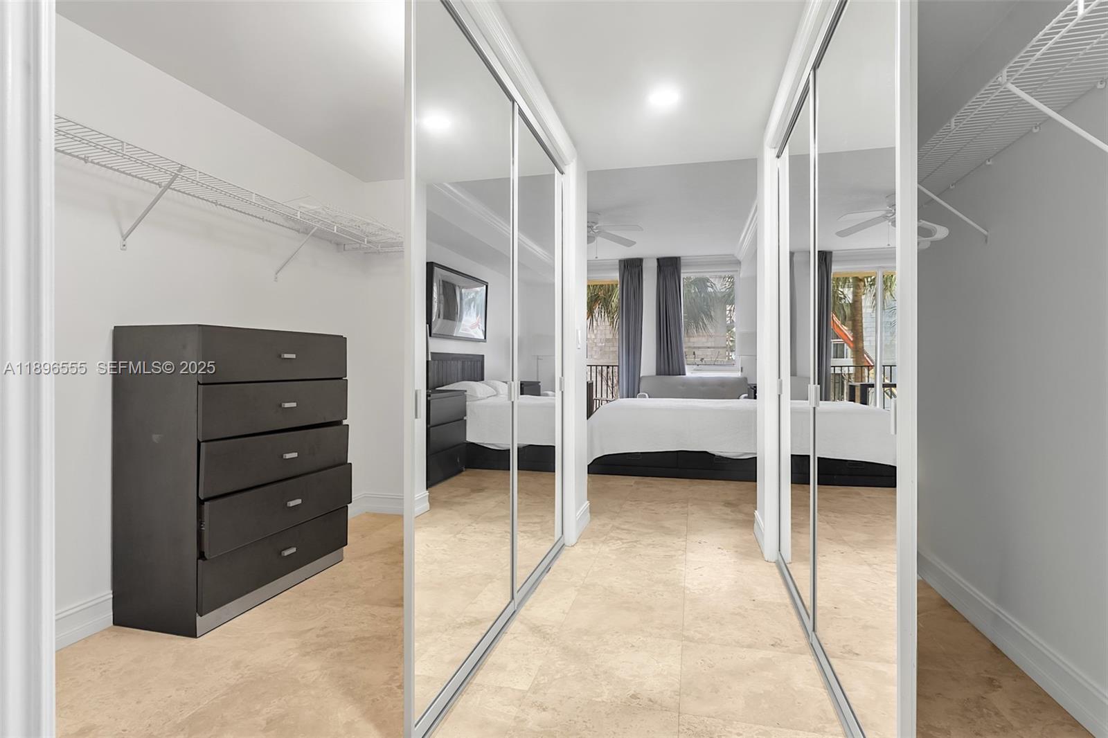 9 Northeast 20th Avenue, Unit 302 Deerfield Beach, FL 33441 - Photo 24 of 55 a view of room with furniture and windows