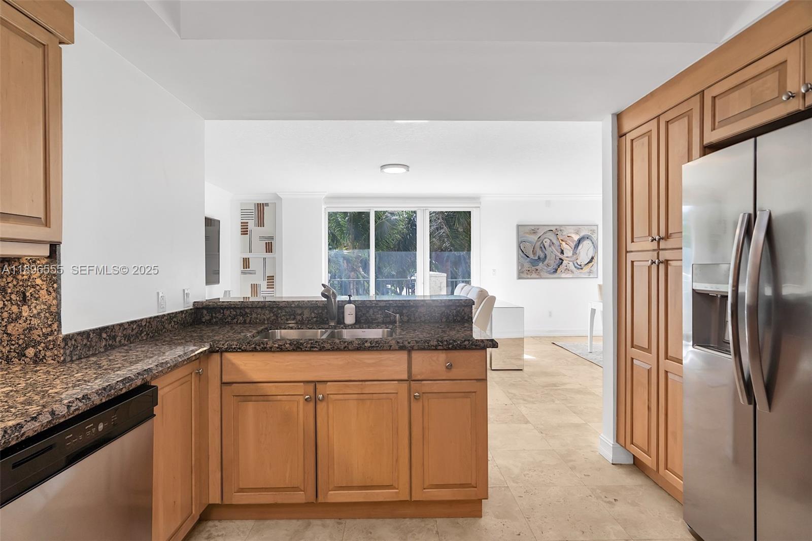 9 Northeast 20th Avenue, Unit 302 Deerfield Beach, FL 33441 - Photo 31 of 55 a spacious bathroom with a granite countertop sink and a mirror