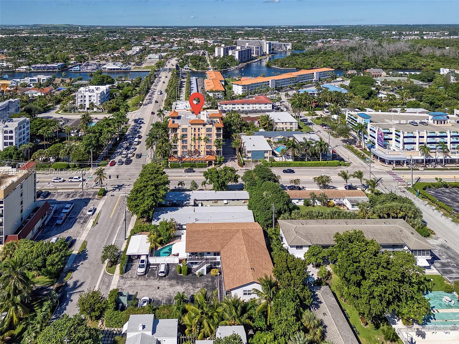 9 Northeast 20th Avenue, Unit 302 Deerfield Beach, FL 33441 - Photo 48 of 55 an aerial view of a city