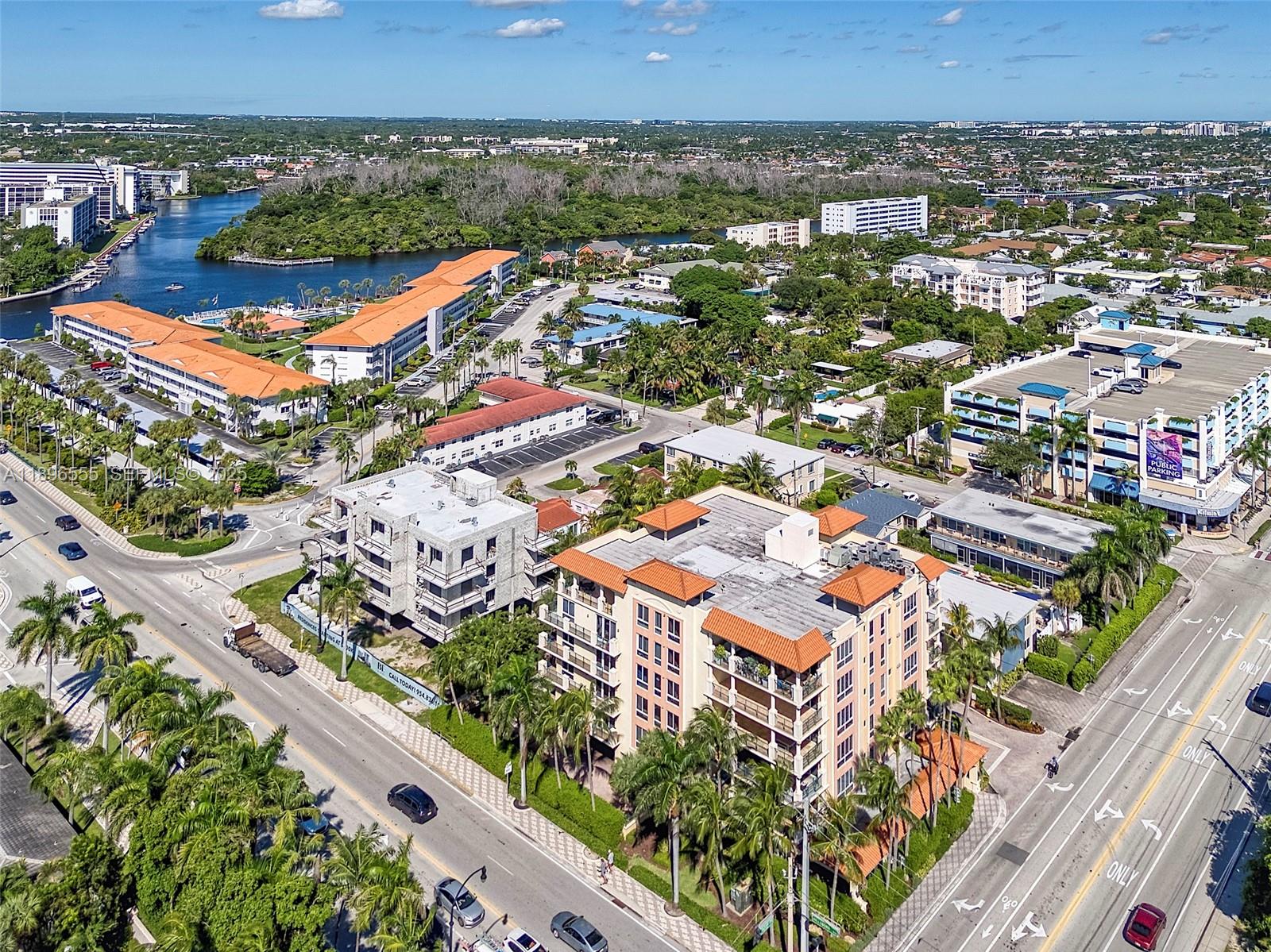 9 Northeast 20th Avenue, Unit 302 Deerfield Beach, FL 33441 - Photo 50 of 55 an aerial view of residential houses with outdoor space