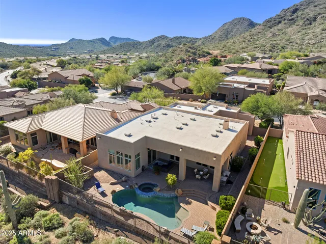 an aerial view of a town with big houses