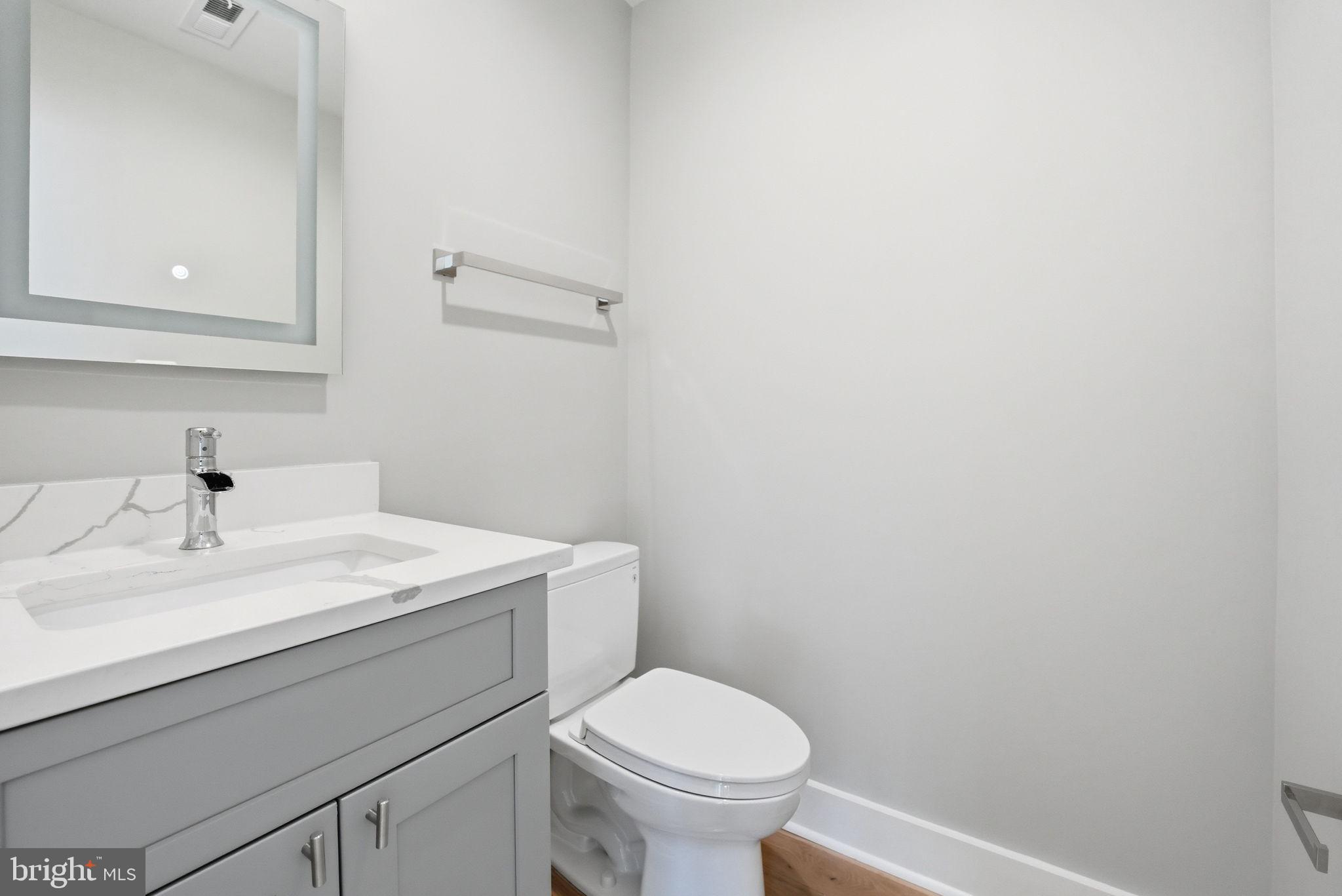 2211 Military Road Arlington, VA 22207 - Photo 77 of 107 Sleek and modern bathroom retreat.