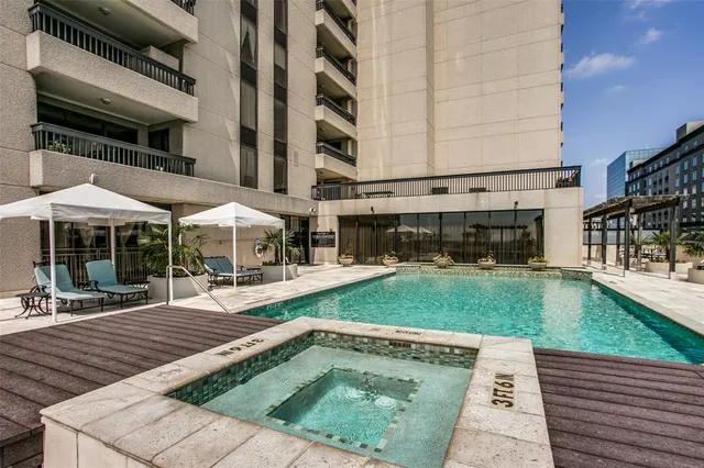a view of a backyard with sitting area