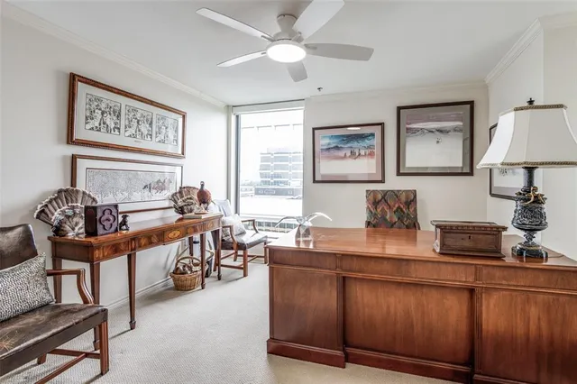 a view of a dining room with furniture wooden floor and chandelier