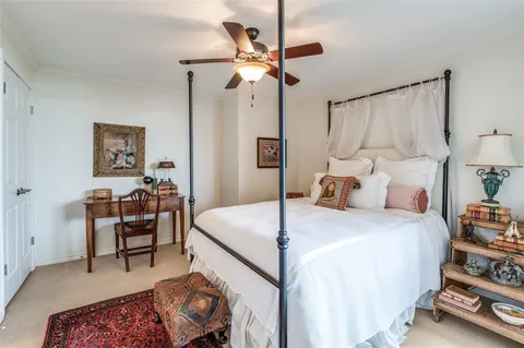 a kitchen with stainless steel appliances granite countertop a sink and a white cabinets