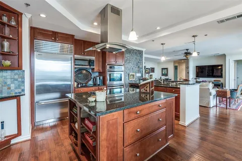 a view of a bathroom sink a mirror and a window