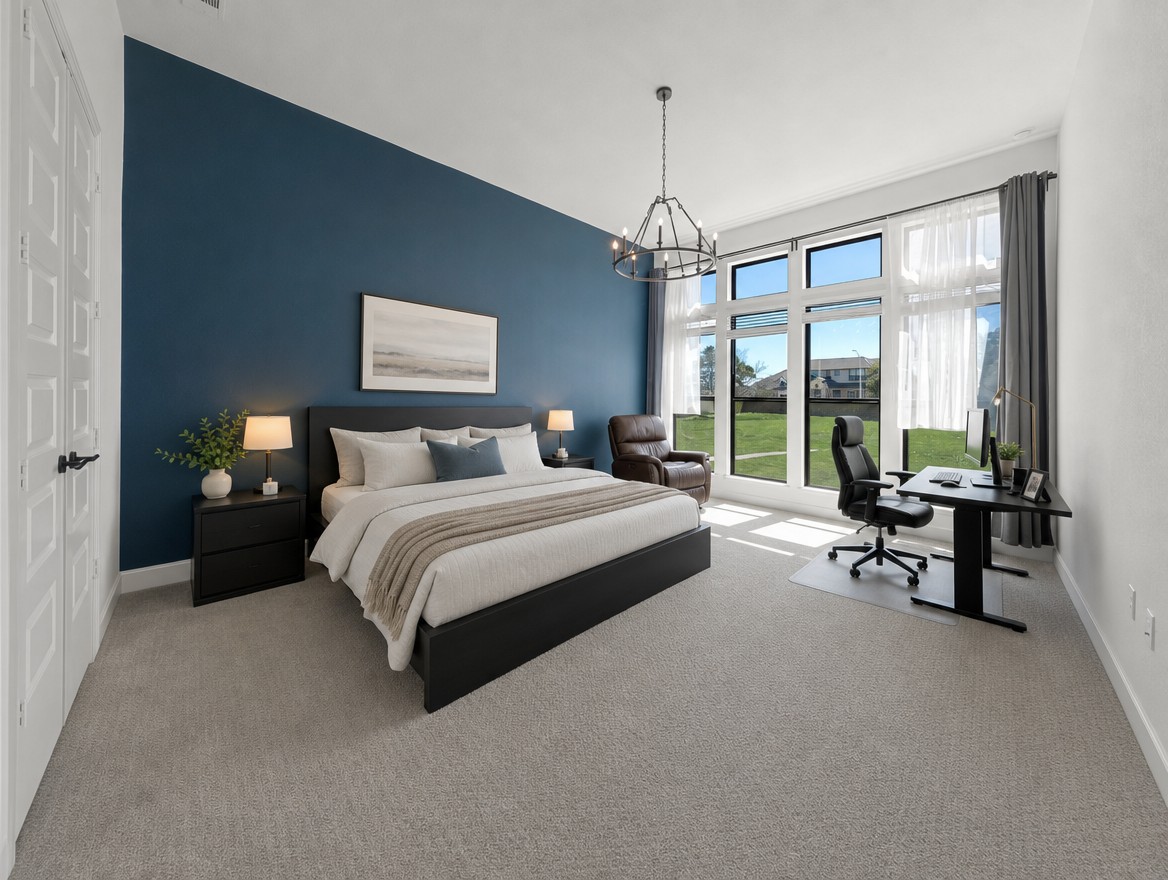 1440 Riva Ridge Drive Leander, TX 78641 - Photo 13 of 37 Natural illumination fills this generously proportioned bedroom, featuring a dedicated workspace and large windows overlooking green space.
