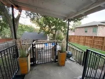 a view of a two chairs in the deck