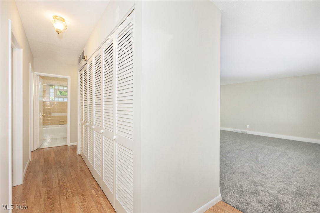 1691 Harwich Road Lyndhurst, OH 44124 - Photo 7 of 45 Hall featuring baseboards and light wood-type flooring