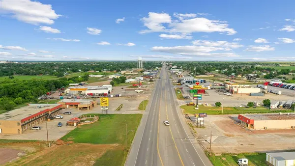 a view of a yard with an ocean
