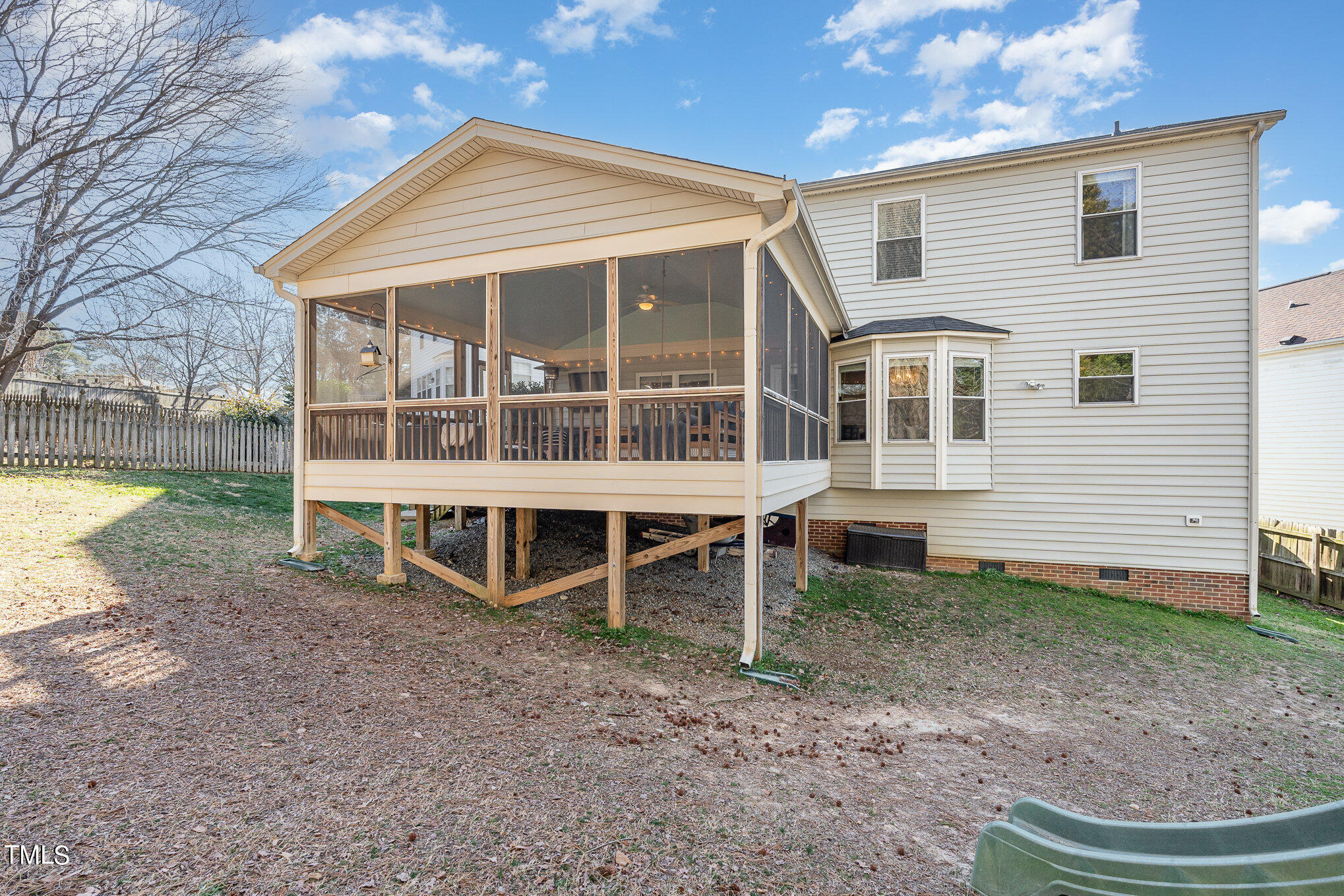 8516 Metronome Lane Raleigh, NC 27613 - Photo 23 of 25 a view of a house with a yard and sitting area