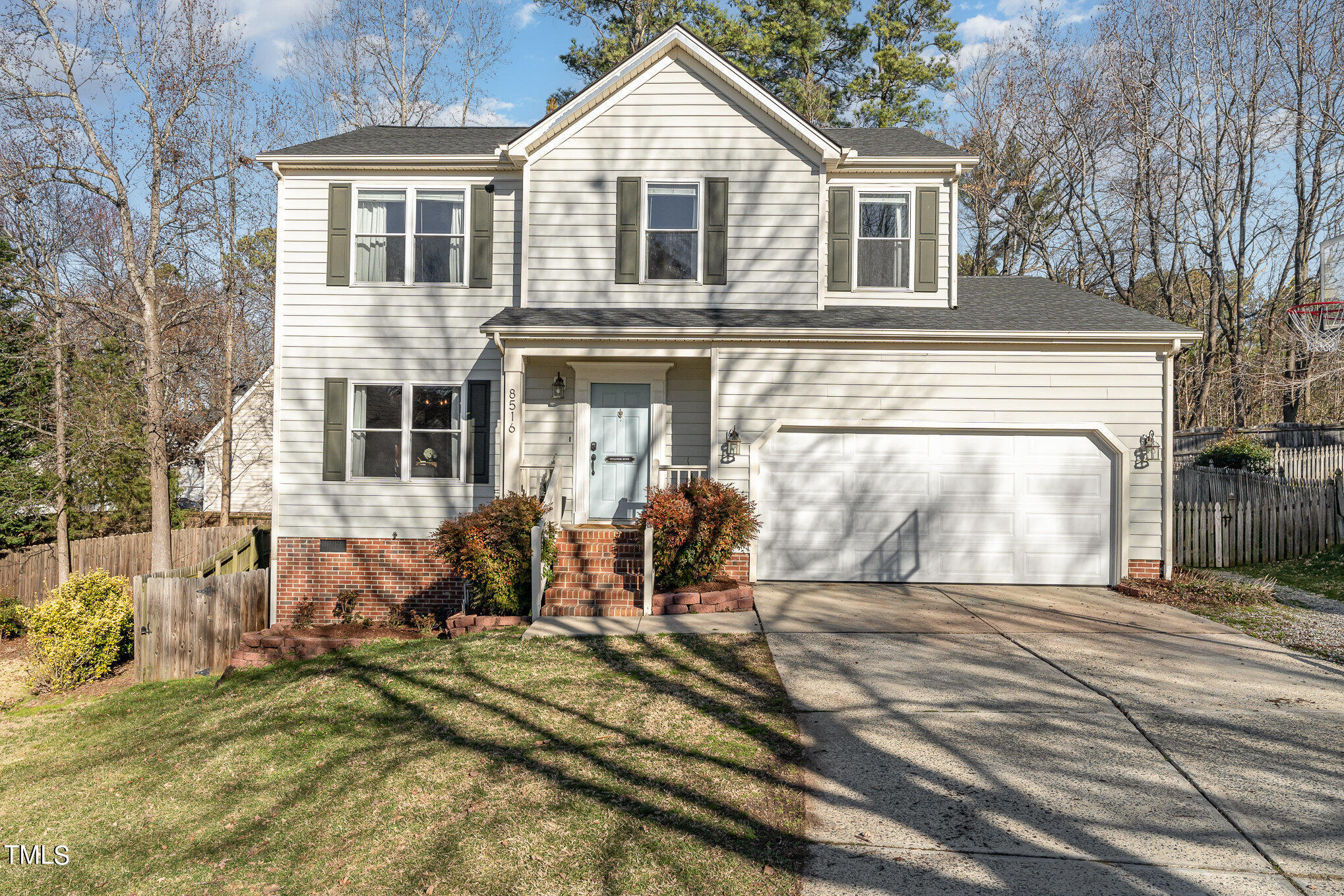 8516 Metronome Lane Raleigh, NC 27613 - Photo 25 of 25 a front view of a house with a yard