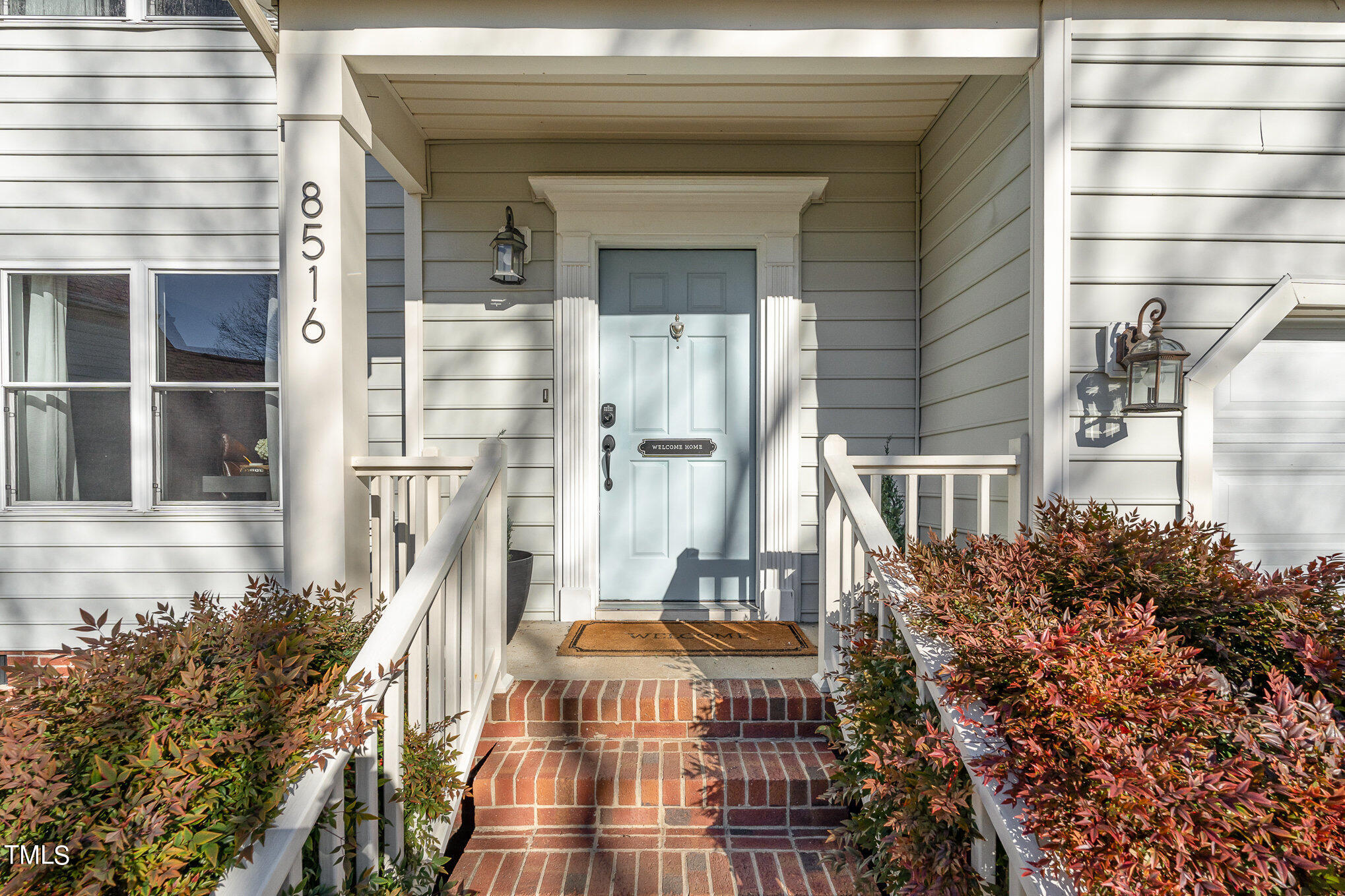 8516 Metronome Lane Raleigh, NC 27613 - Photo 6 of 25 a view of a balcony with a potted plants