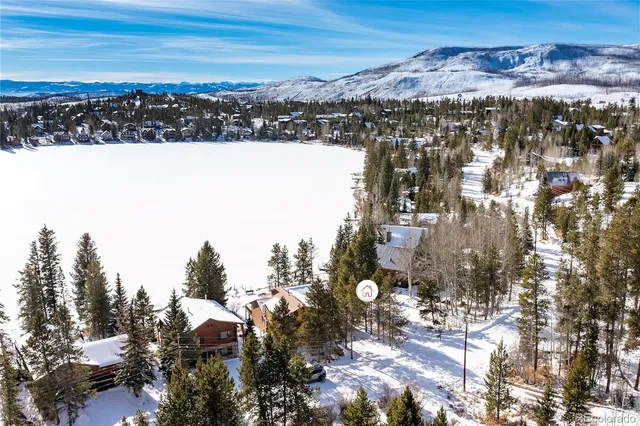 a view of ocean with a mountain