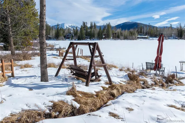 a view of a car park in front of house