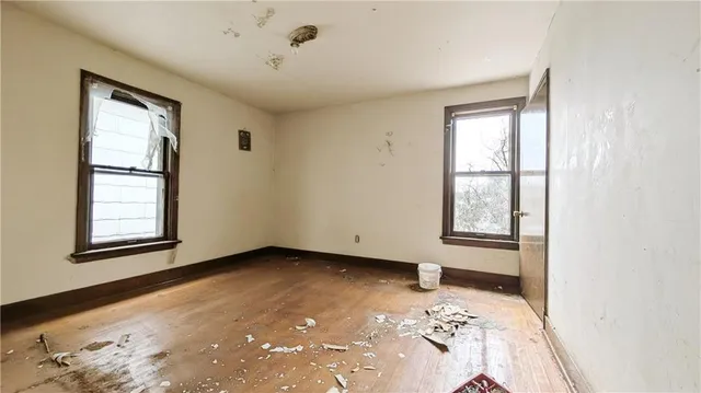 an empty room with windows