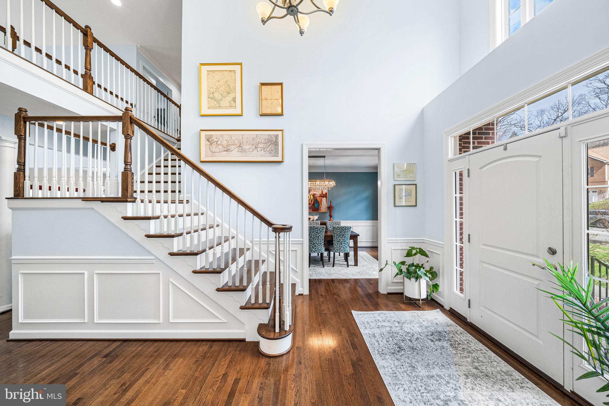 1232 Shenandoah Road Alexandria, VA 22308 - Photo 4 of 50 a view of entryway with wooden floor and stairs