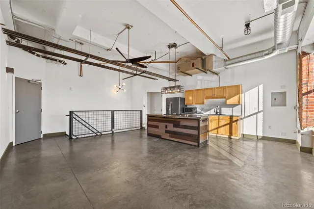 a view of a room with wooden walls