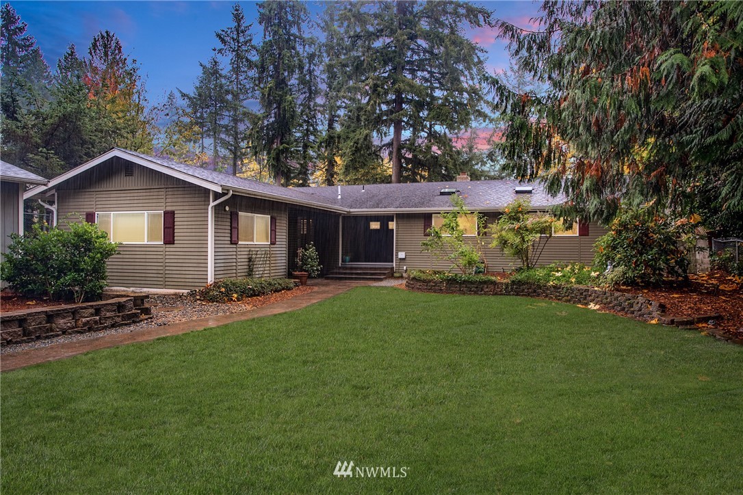 16945 Southeast 149th Street Renton, WA 98059 - Photo 2 of 40 a view of a house with backyard and garden