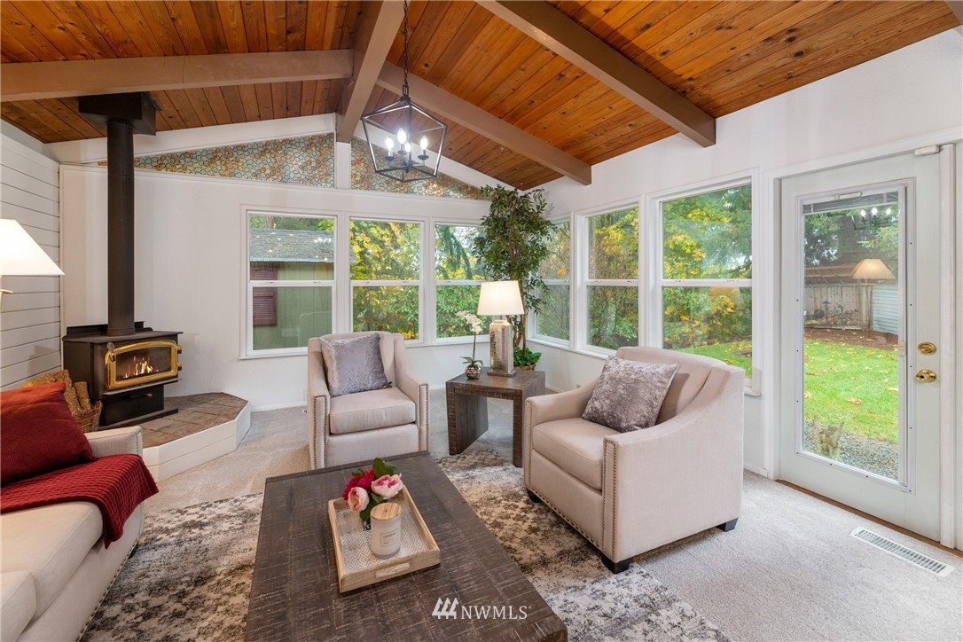 16945 Southeast 149th Street Renton, WA 98059 - Photo 18 of 40 a living room with furniture and a large window