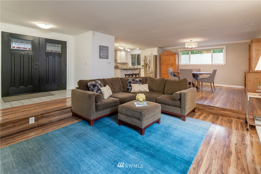 16945 Southeast 149th Street Renton, WA 98059 - Photo 4 of 40 a living room with furniture and wooden floor