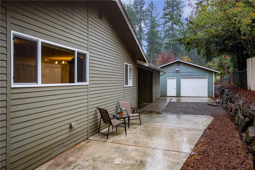 16945 Southeast 149th Street Renton, WA 98059 - Photo 35 of 40 a view of backyard with a patio and outdoor seating