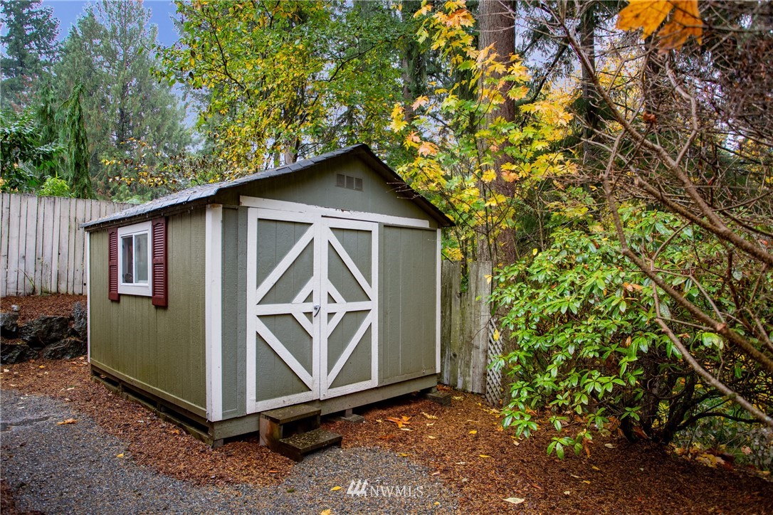 16945 Southeast 149th Street Renton, WA 98059 - Photo 39 of 40 a front view of a house with garden