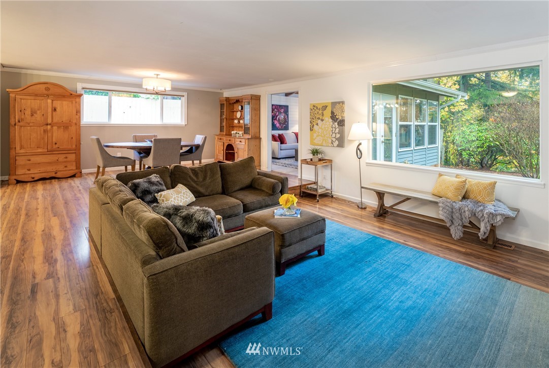16945 Southeast 149th Street Renton, WA 98059 - Photo 5 of 40 a living room with furniture and a large window