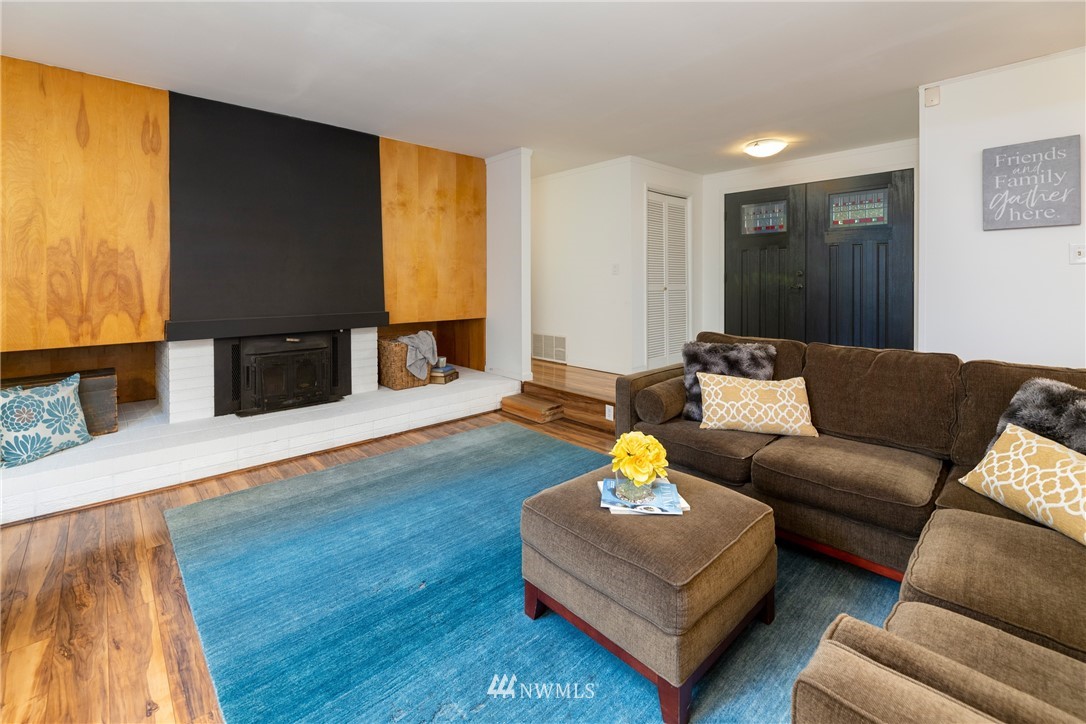 16945 Southeast 149th Street Renton, WA 98059 - Photo 6 of 40 a living room with furniture and a wooden floor