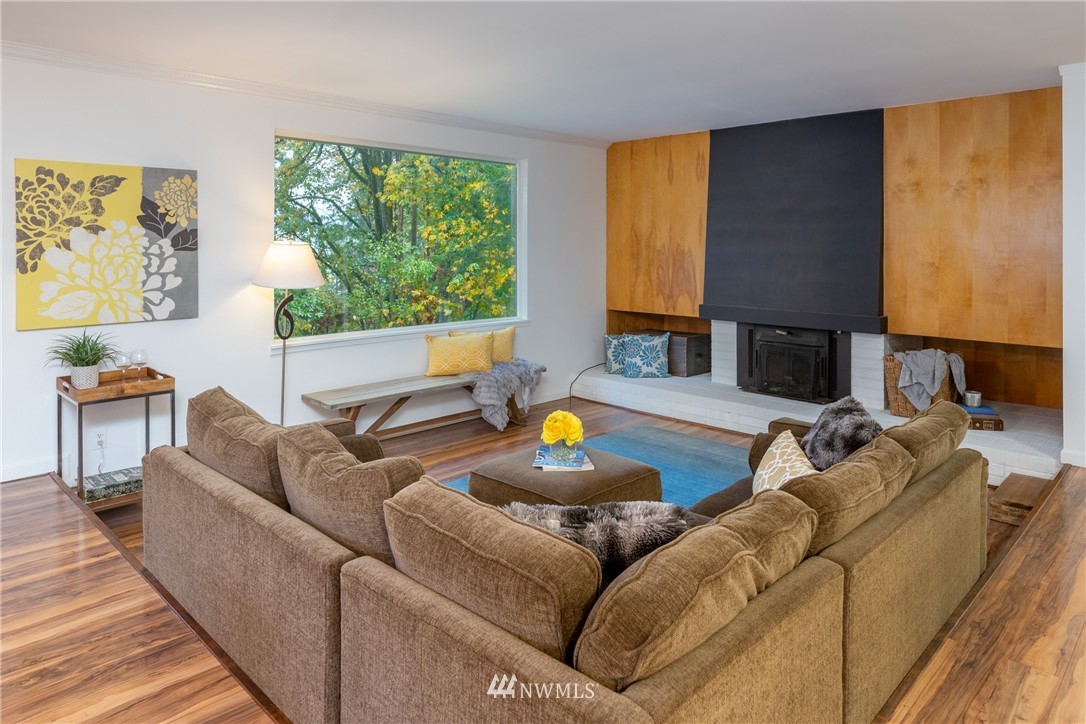 16945 Southeast 149th Street Renton, WA 98059 - Photo 7 of 40 a living room with furniture and a large window