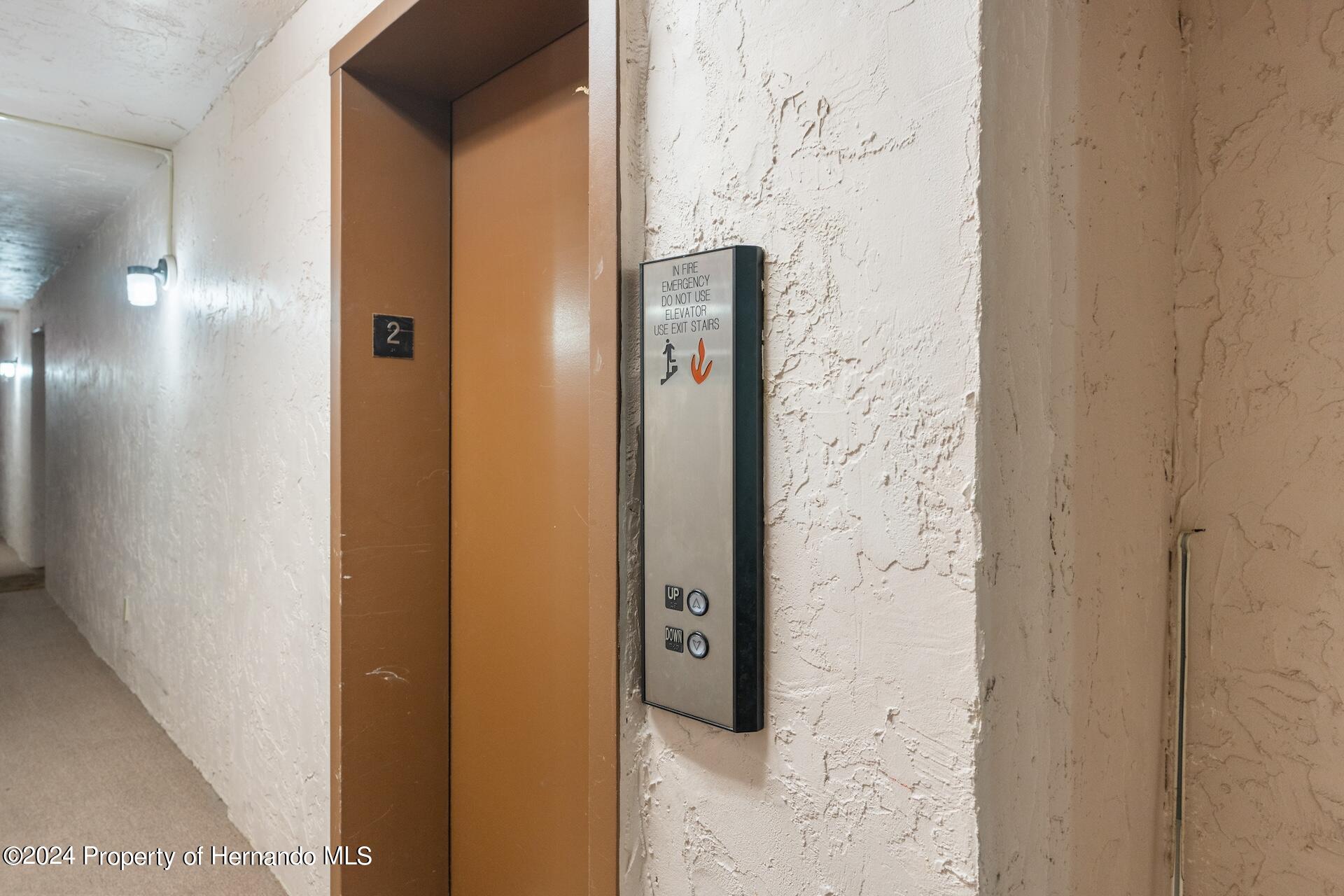 5541 Bay Boulevard Port Richey, FL 34668 - Photo 17 of 22 a bathroom with a shower and a mirror