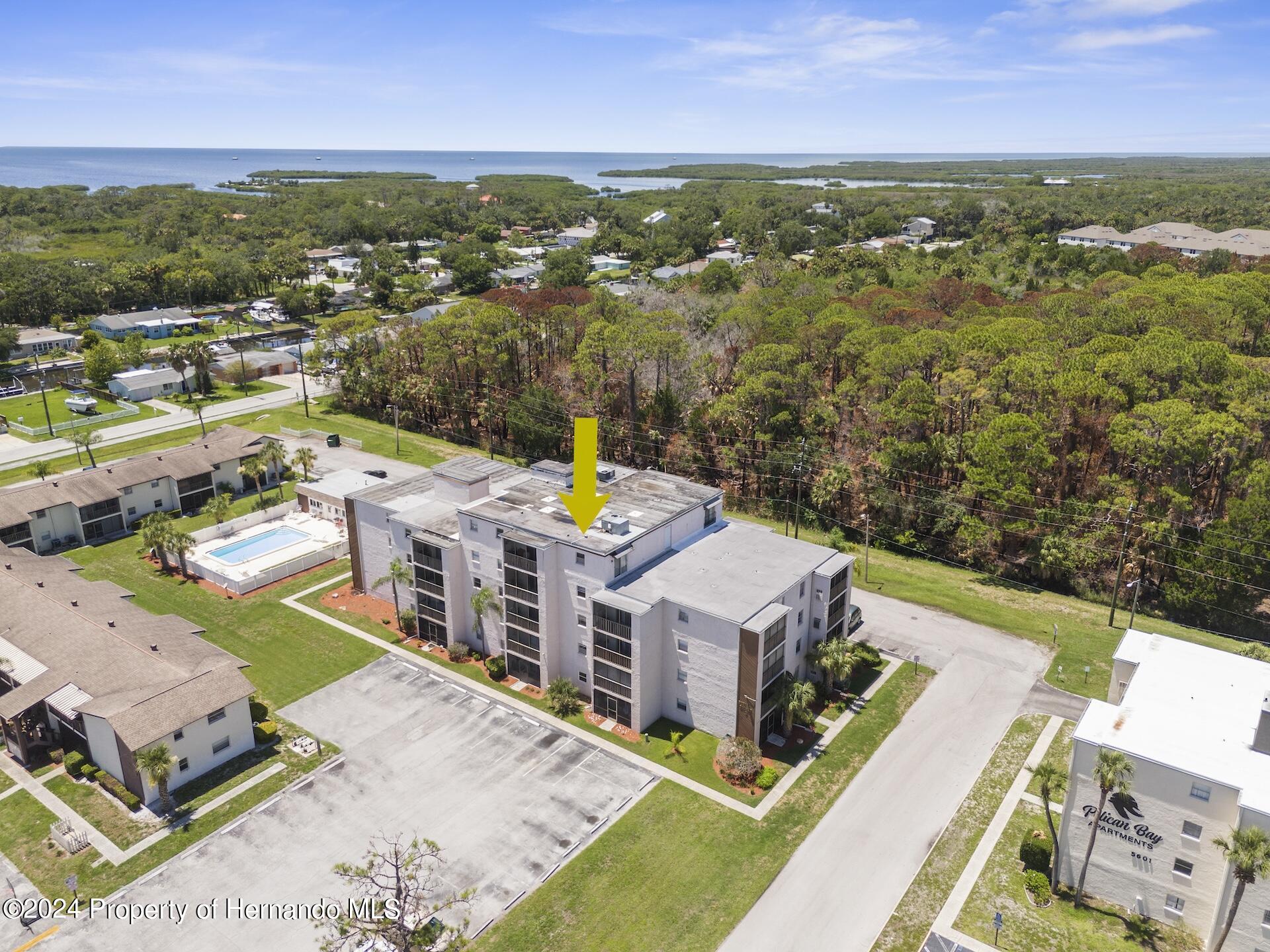 5541 Bay Boulevard Port Richey, FL 34668 - Photo 3 of 22 an aerial view of a house with a garden