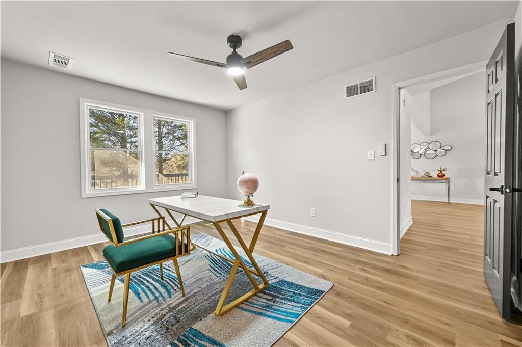 3413 Underwood Road Southeast Conyers, GA 30013 - Photo 17 of 42 a living room with furniture and a window