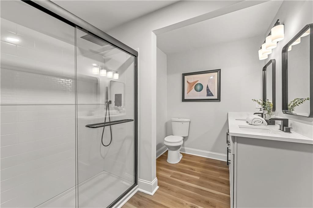 3413 Underwood Road Southeast Conyers, GA 30013 - Photo 24 of 42 a bathroom with a toilet sink and shower