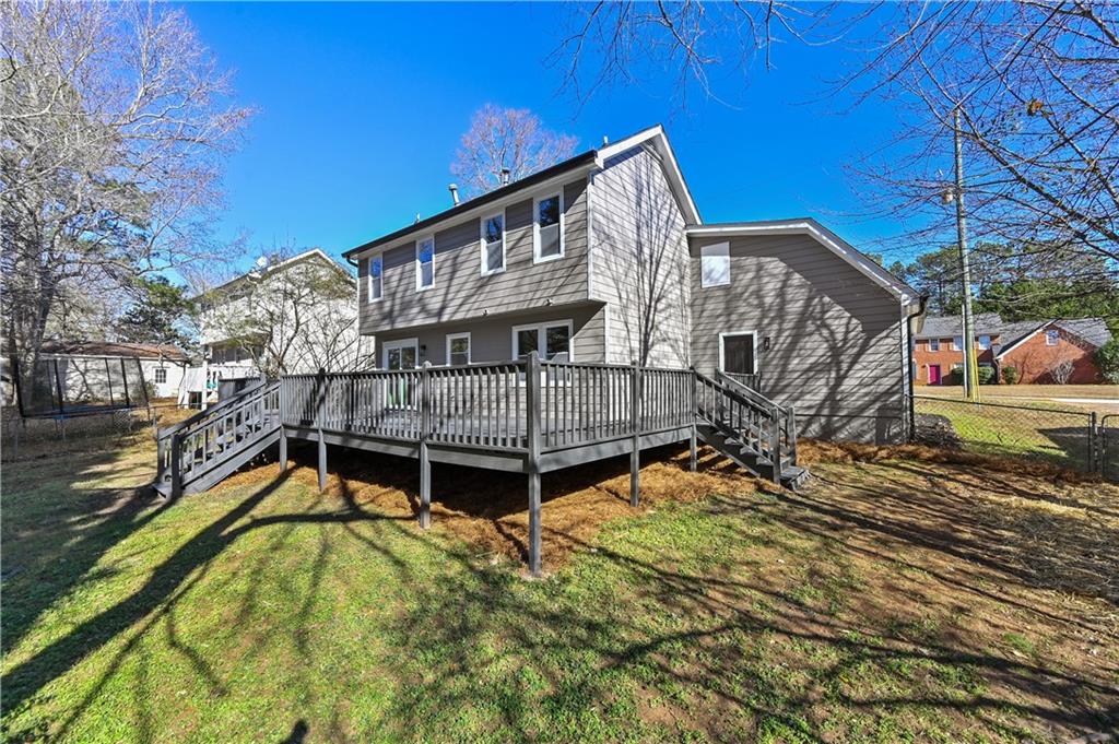 3413 Underwood Road Southeast Conyers, GA 30013 - Photo 39 of 42 a view of a house with a yard
