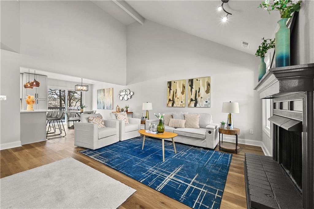 3413 Underwood Road Southeast Conyers, GA 30013 - Photo 6 of 42 a living room with furniture and a fireplace