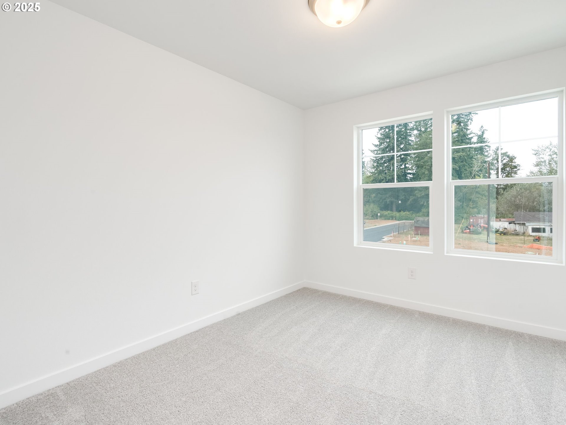 2125 Southwest 5th Place Battle Ground, WA 98604 - Photo 22 of 36 an empty room with a window