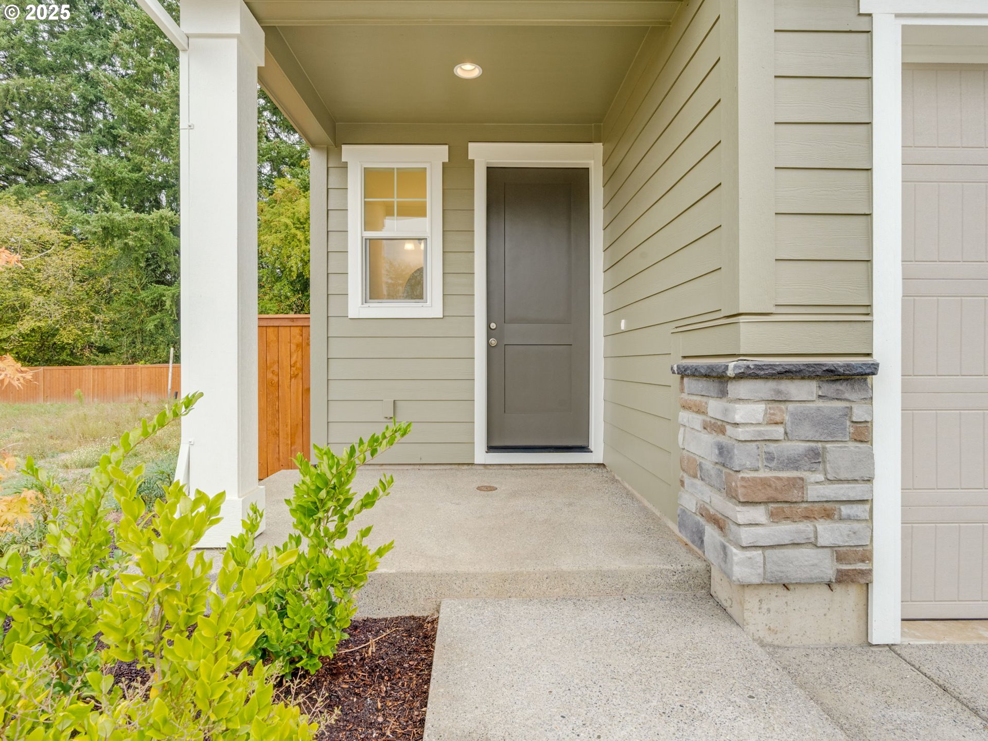 2125 Southwest 5th Place Battle Ground, WA 98604 - Photo 3 of 36 a front view of a house with a garden