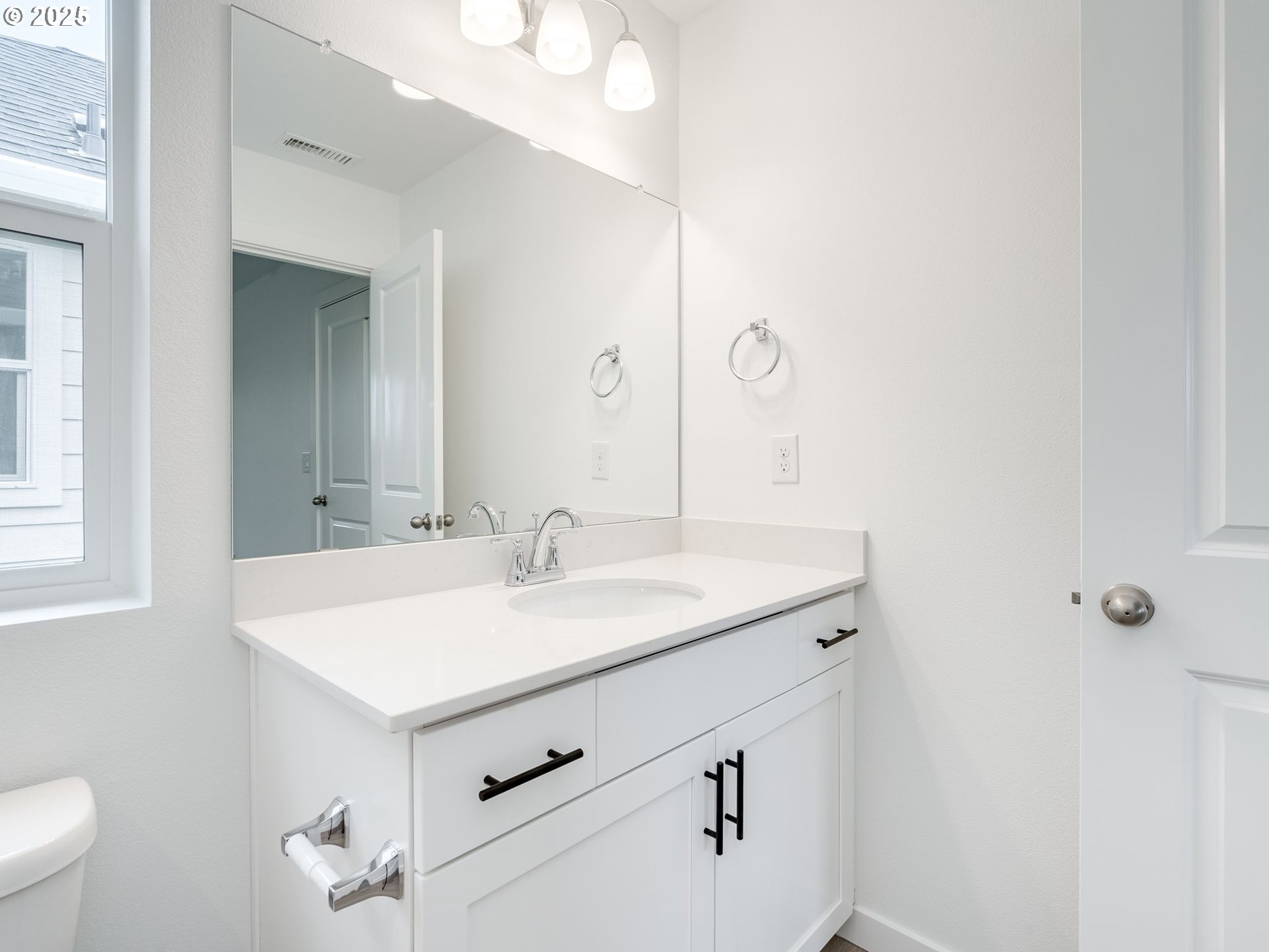 2125 Southwest 5th Place Battle Ground, WA 98604 - Photo 31 of 36 a bathroom with a sink and a mirror