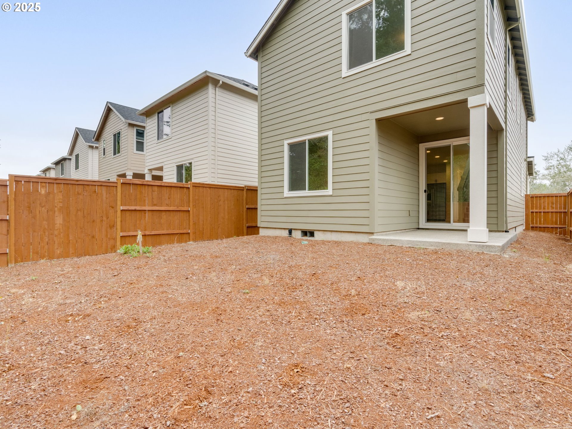 2125 Southwest 5th Place Battle Ground, WA 98604 - Photo 32 of 36 a view of a house with a backyard
