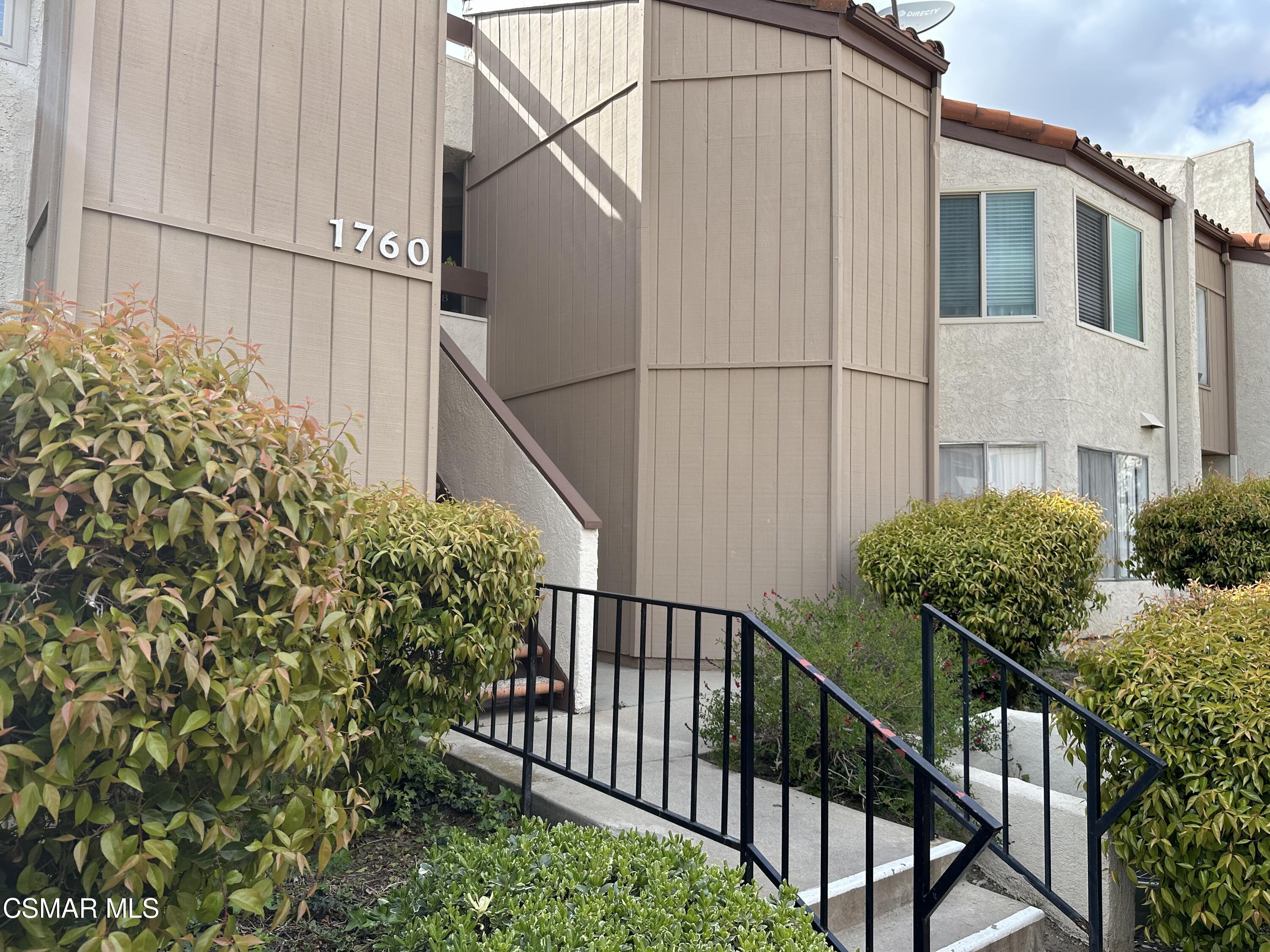 1760 Sinaloa Road, Unit 167 Simi Valley, CA 93065 - Photo 1 of 8 a view of a house with a street